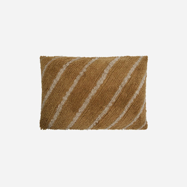 fluffy orange cushion with thin stripes of beige running diagonally accross the tuffted cotton from house doctor