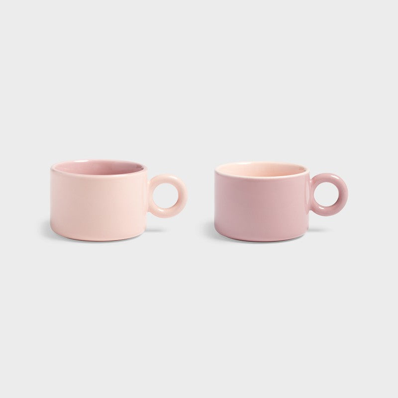 Product image of the Chiquito pink mug set of two with round handles.