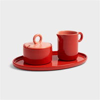 red chiquito milk jug with matching sugar pot and serving plateau by &k