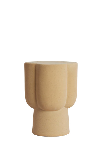 Light & Living JUNTO ceramic side table in matt sand, styled with amber glass vases of dried flowers