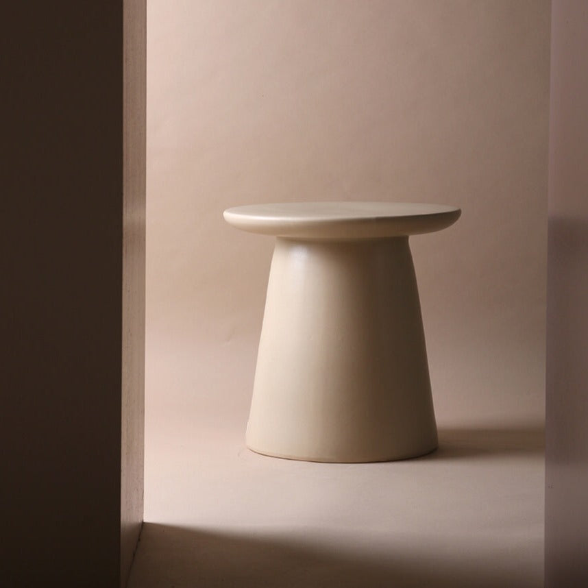 Handmade cream side table for Nordic-inspired spaces