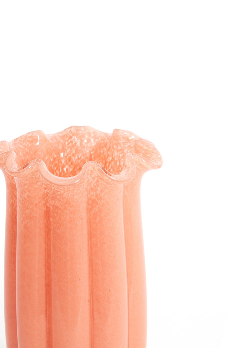 close up of fluted peach glass sedona vase with ruffled rim