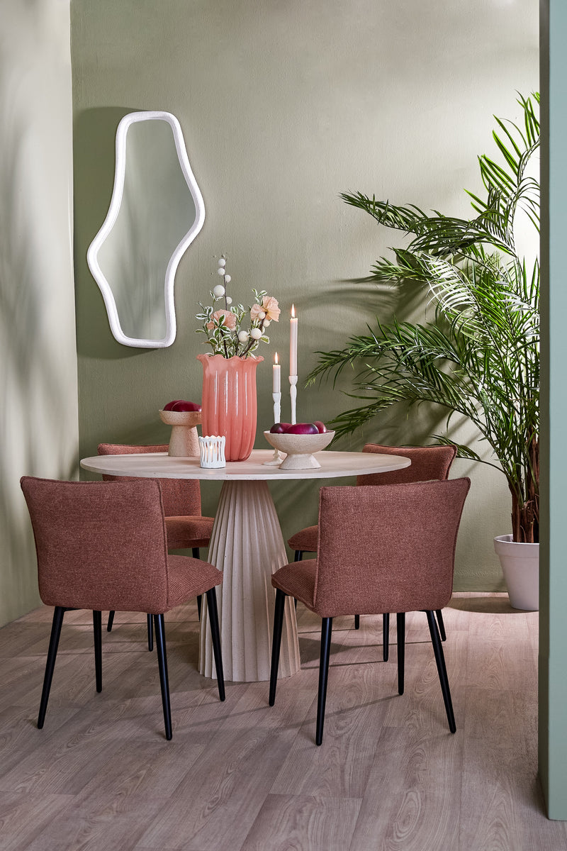 peach sedona glass vase styled on dining table with soft green walls