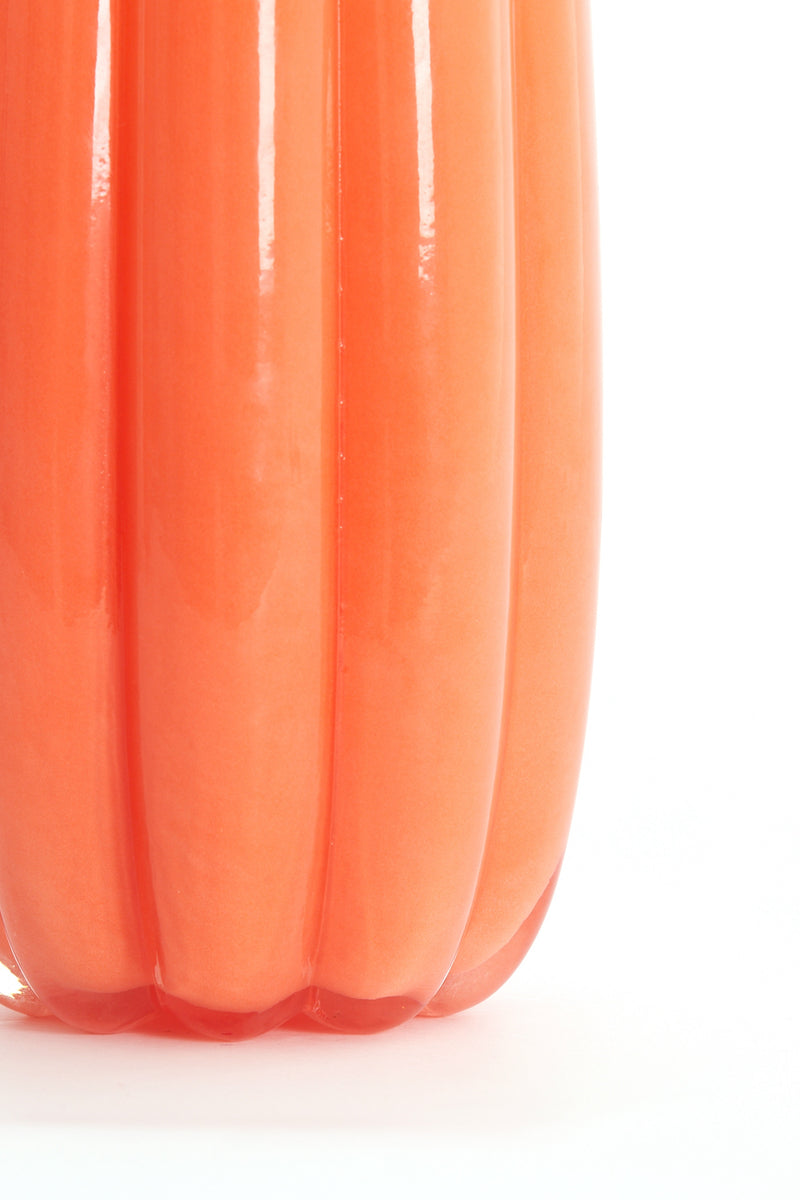 orange Sedona vase showing rippled vertical texture and glossy finish