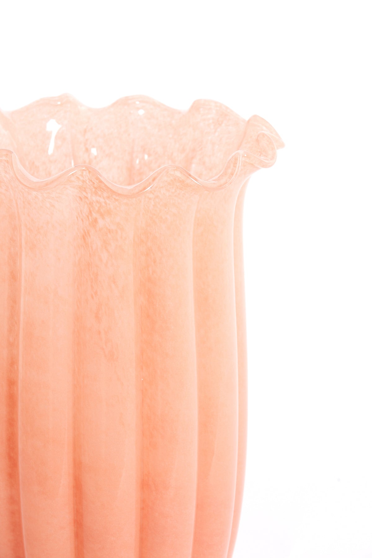 close-up of peach sedona fluted glass vase showing scalloped wavy rim