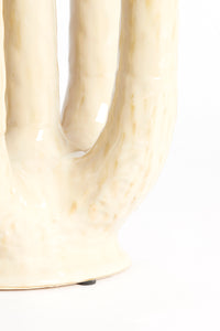 detail of multi-tube sculptural design on beige ceramic LEONJO vase
