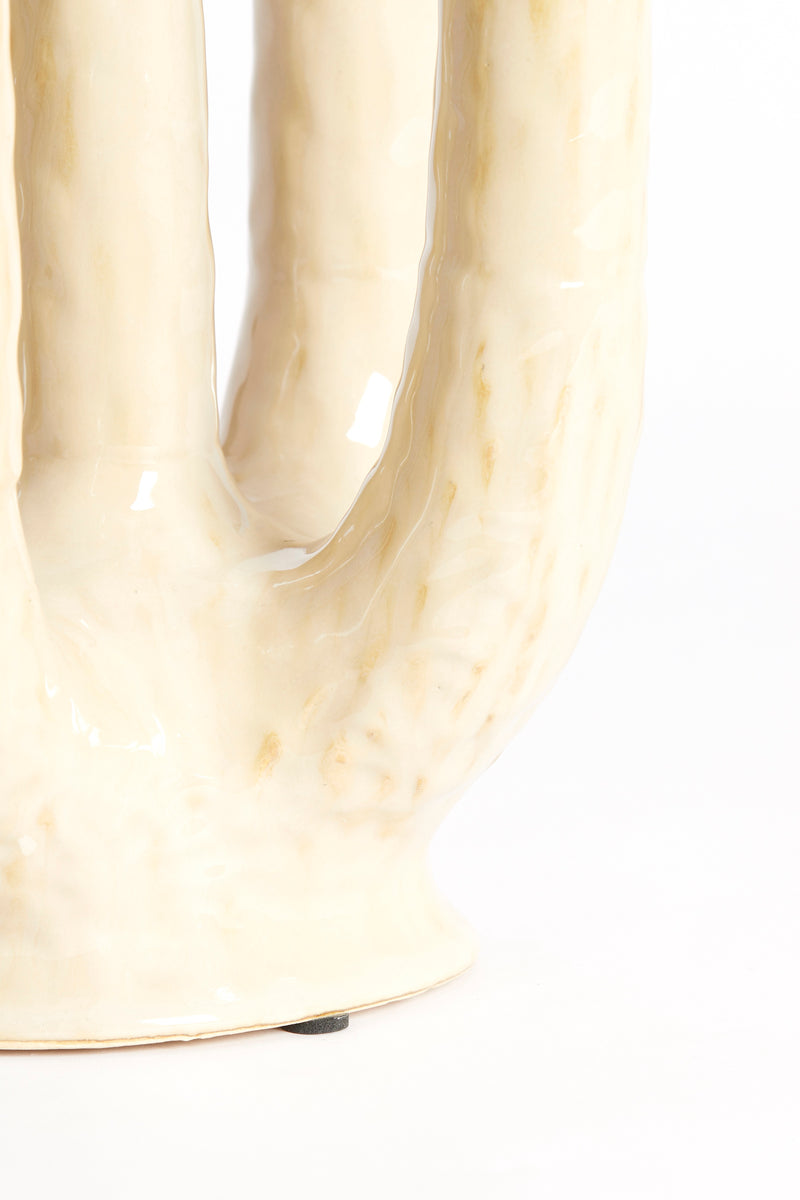 detail of multi-tube sculptural design on beige ceramic LEONJO vase