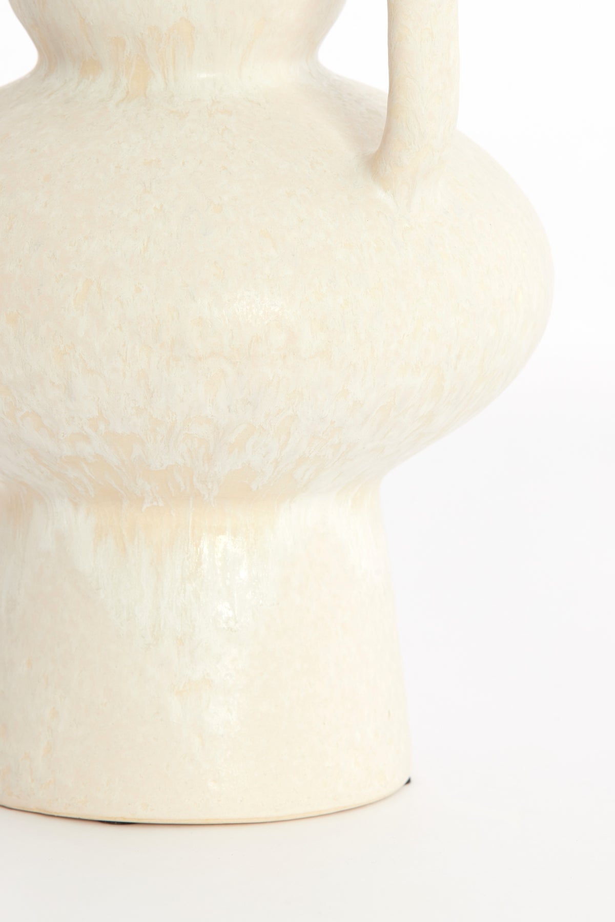 detailed view of textured cream ceramic surface on OTARU decorative vase
