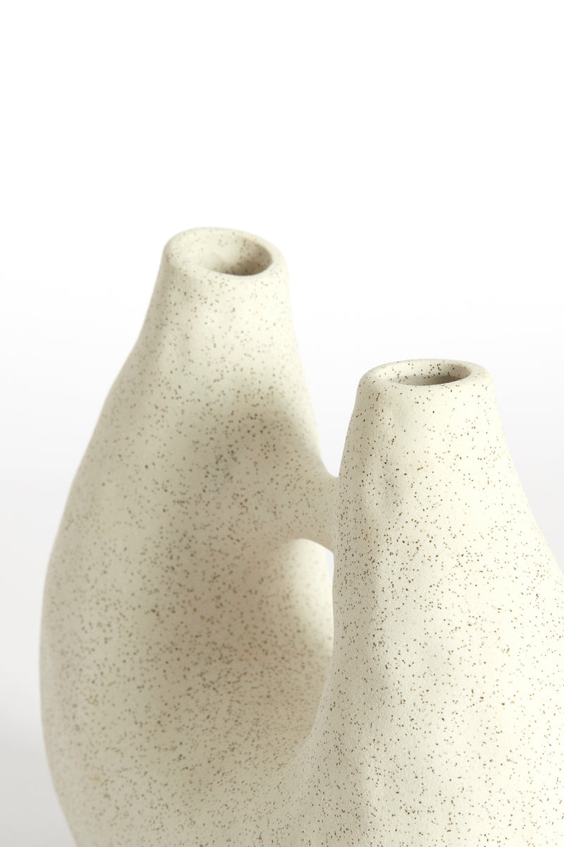 close up of katha sculptural vase showing matte cream texture and organic curves
