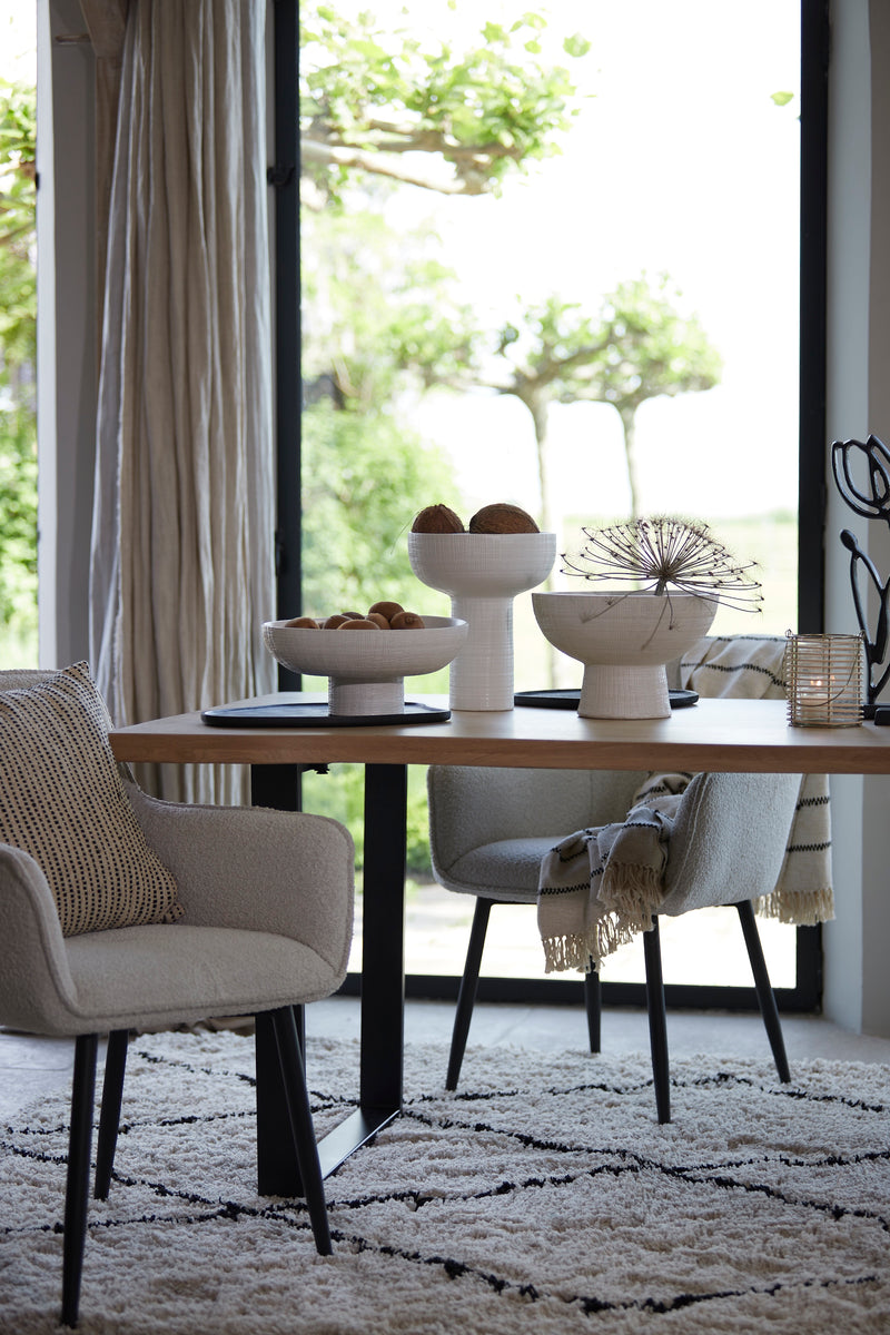 black wooden styling tray used under ceramic bowls in modern dining room
