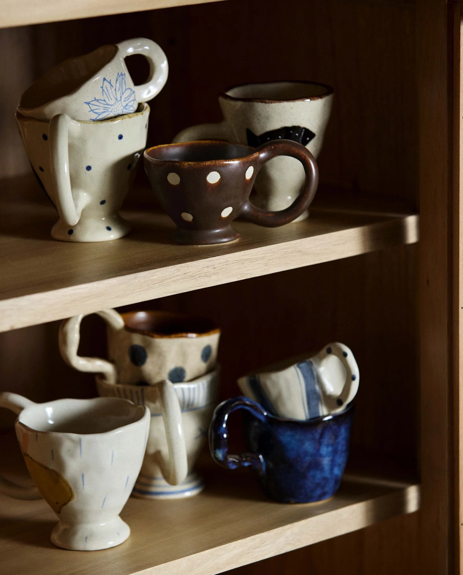 GOGI cup by Nordal in cream with hand-painted blue stripes, plain product shot