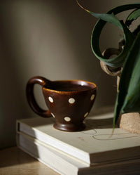 ZINA cup by Nordal in deep brown with cream hand-painted dots, plain product shot