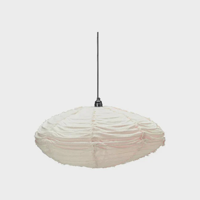 Floating white ceiling shade with frayed linen seams