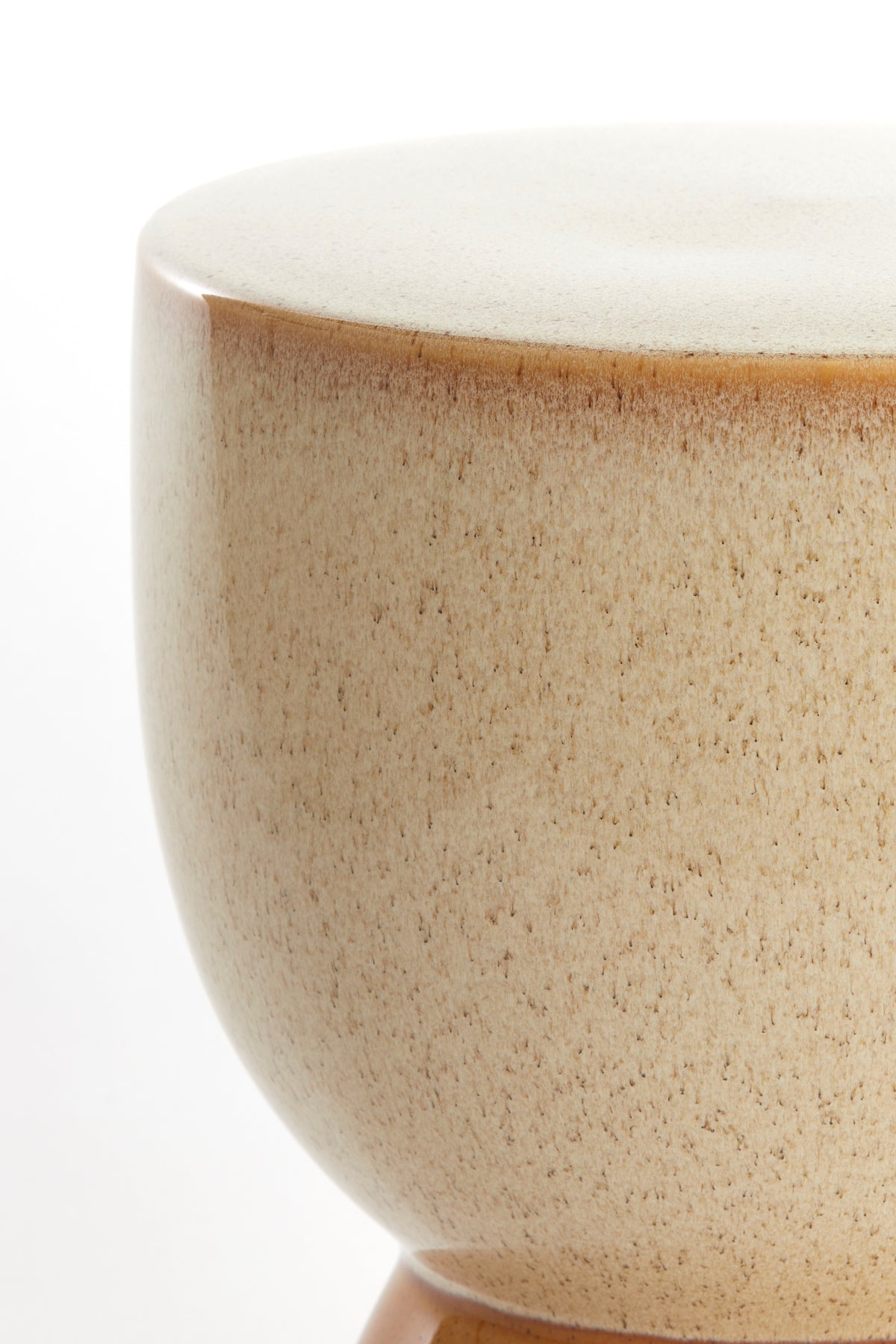 close-up of cream glazed ceramic top of finca side table by light & living