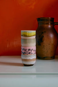 stacked 70s ceramic café cups showing hand-finished textured glazes
