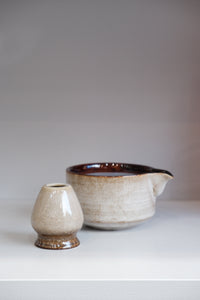 side view of 80s style matcha bowl set showing brown interior glaze and pouring spout
