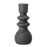 sculptural black stoneware candle holder with reactive glaze finish