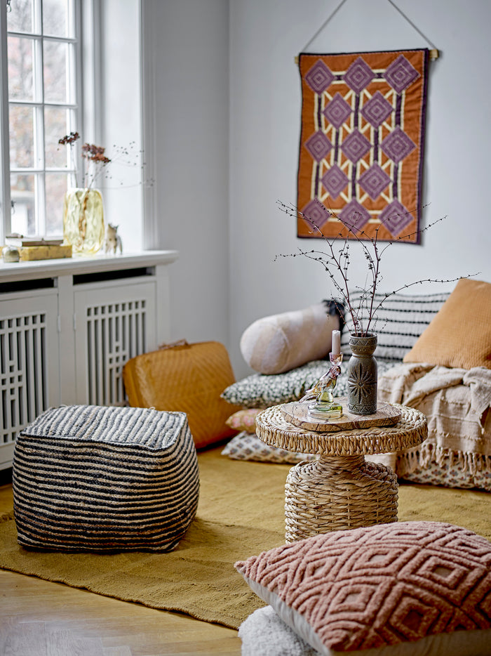 relaxed living room styling featuring brown striped katrin bolster cushion