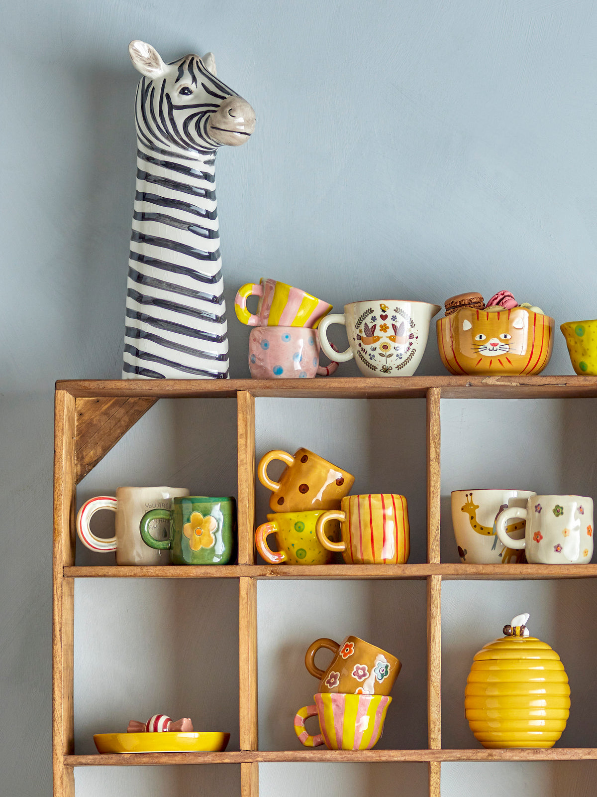 Bloomingville MINI Addy cups and matching kids tableware in a playful display
