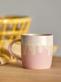 Louisa rose pink mug displayed on a kitchen shelf with pastel ceramics
