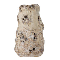 Noble beige stoneware vase side view showing varied hole sizes and glaze texture