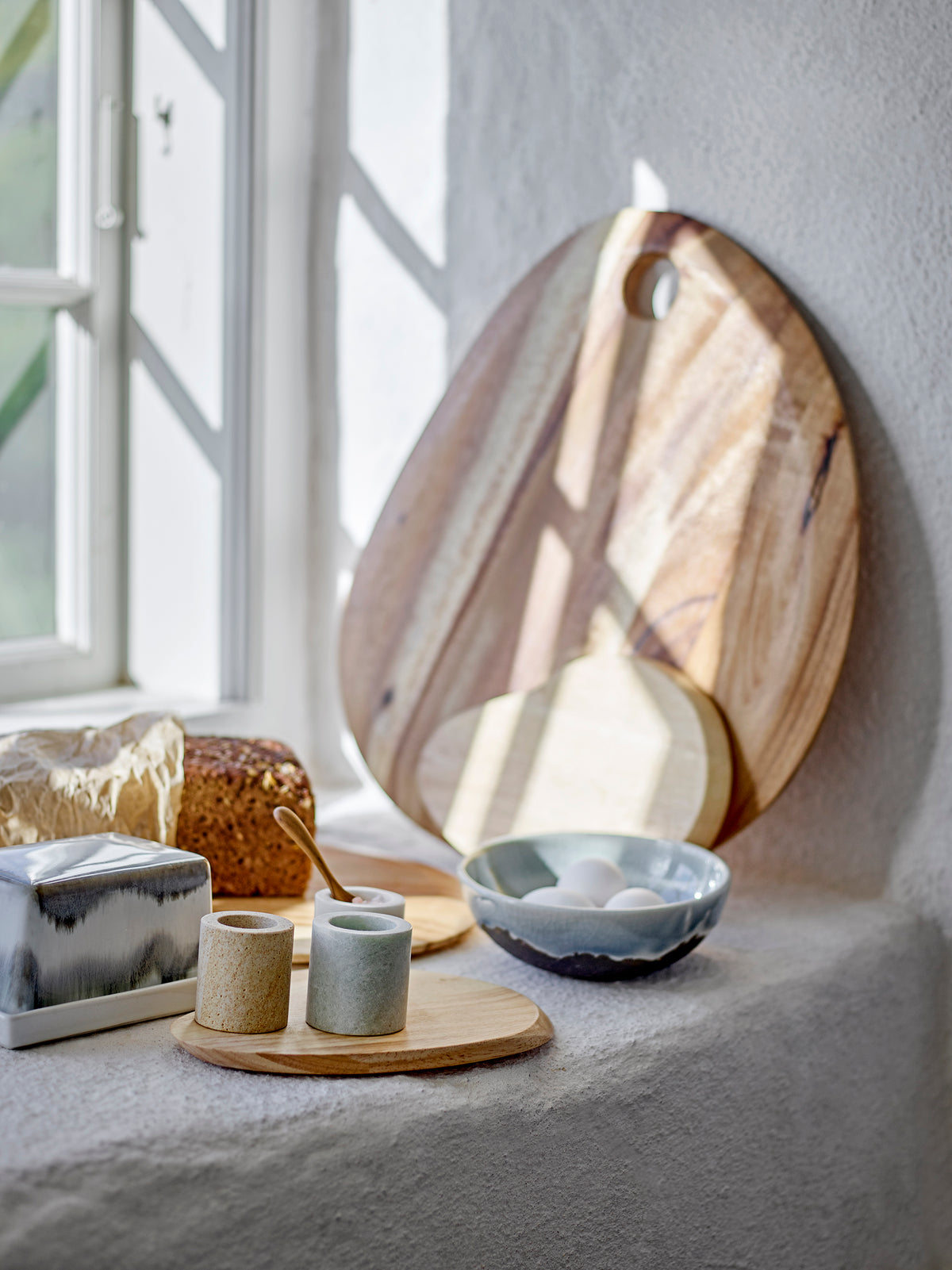 grey stoneware paula butter box on a bright kitchen windowsill
