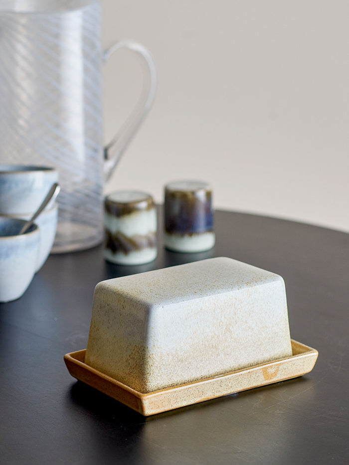 bloomingville paula butter box in nature reactive glaze on a dark table
