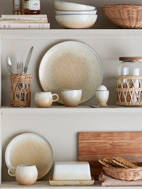 natural stoneware butter box styled with coordinating tableware in a Nordic kitchen
