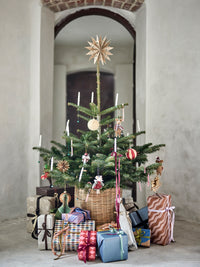 decorated christmas tree with handcrafted felt mice and parcels under the tree