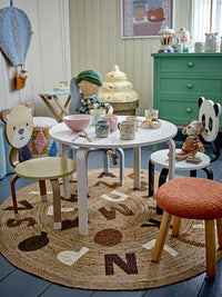 Dorthea cup styled with other playful mugs and bowls for a child’s tea party
