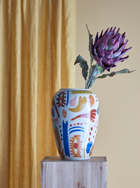 Horus multicolour stoneware vase front view showing blue eye decal motif