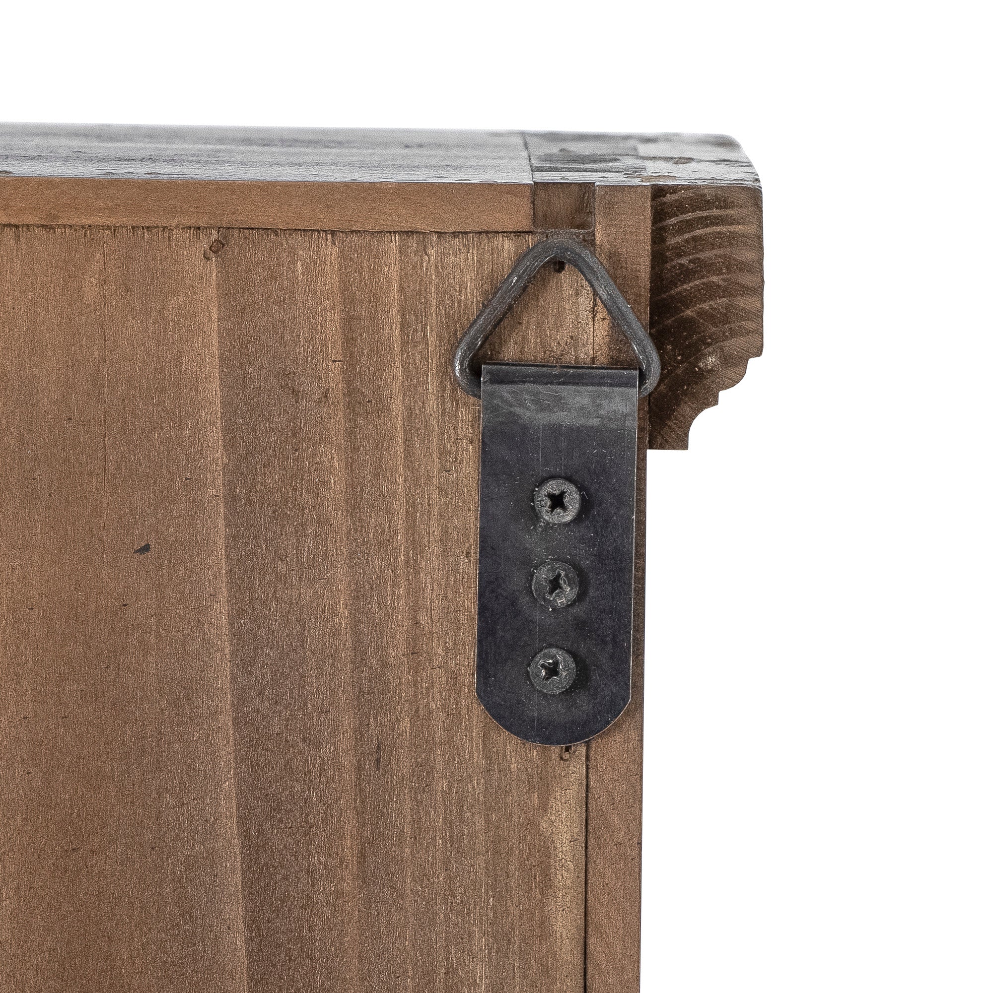 Close-up of a top corner of the Hazem cabinet, showing the hanging bracket and worn black lacquer finish