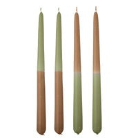 four green dip dye burma candles by bloomingville showing handmade variation