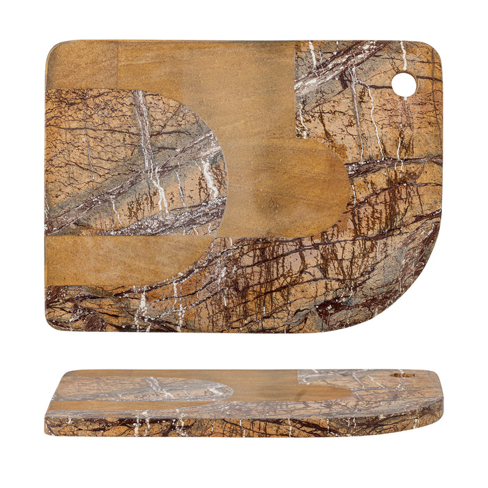 Flat lay of the Abrianna brown marble cutting board highlighting its curved shape and detailed veining.