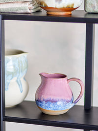 pink and blue bloomingville paula milk jug styled on a shelf with other ceramics