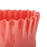 Close up of Janine vase showing fluted wavy glass rim in coral red