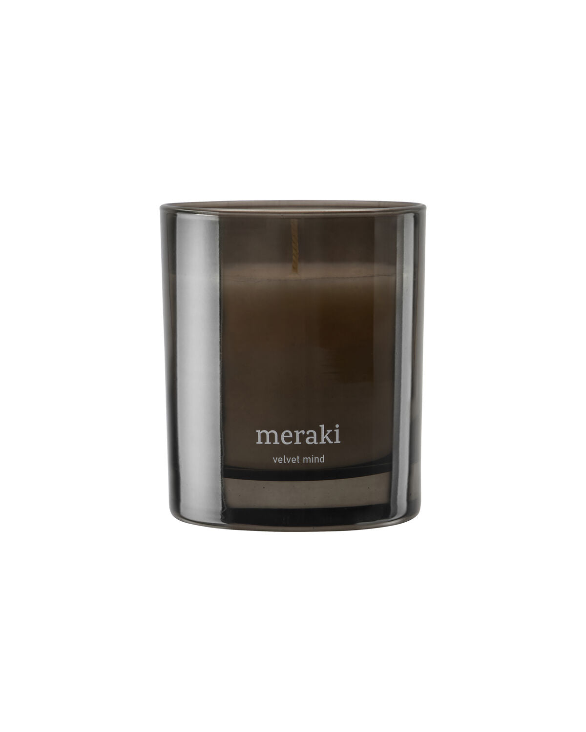 Meraki Velvet Mind scented candle in a smoked grey glass jar, shown unlit against a white background