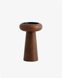 BAWE candle holder in mango wood by Nordal styled on a marble side table with lit pillar candles
