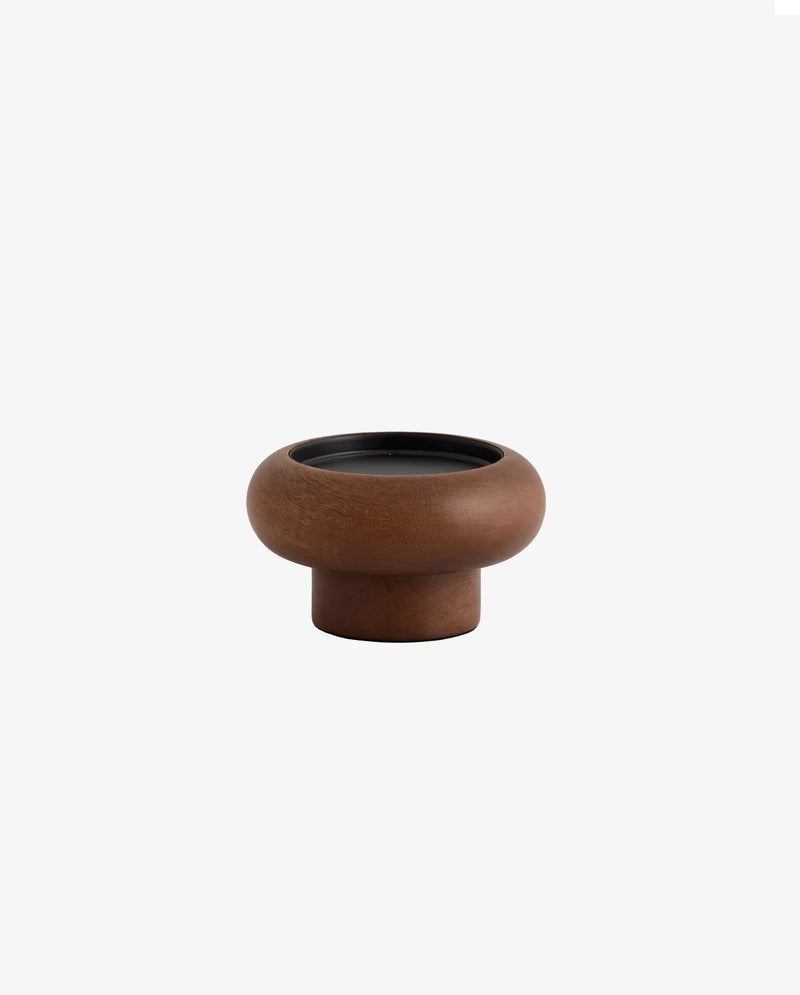 BAWE candle holders in mango wood by Nordal styled on a marble side table with lit pillar candles