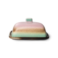 the mercury butter dish with its pink purple, brown, and green lid and deep brown base