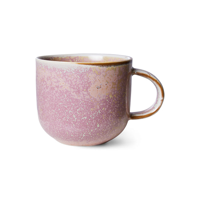 blotchy and spotty colours of pink and light purle with highlights of light blue and dark brown bring this mug and it's joy to life from dutch design house hkliving