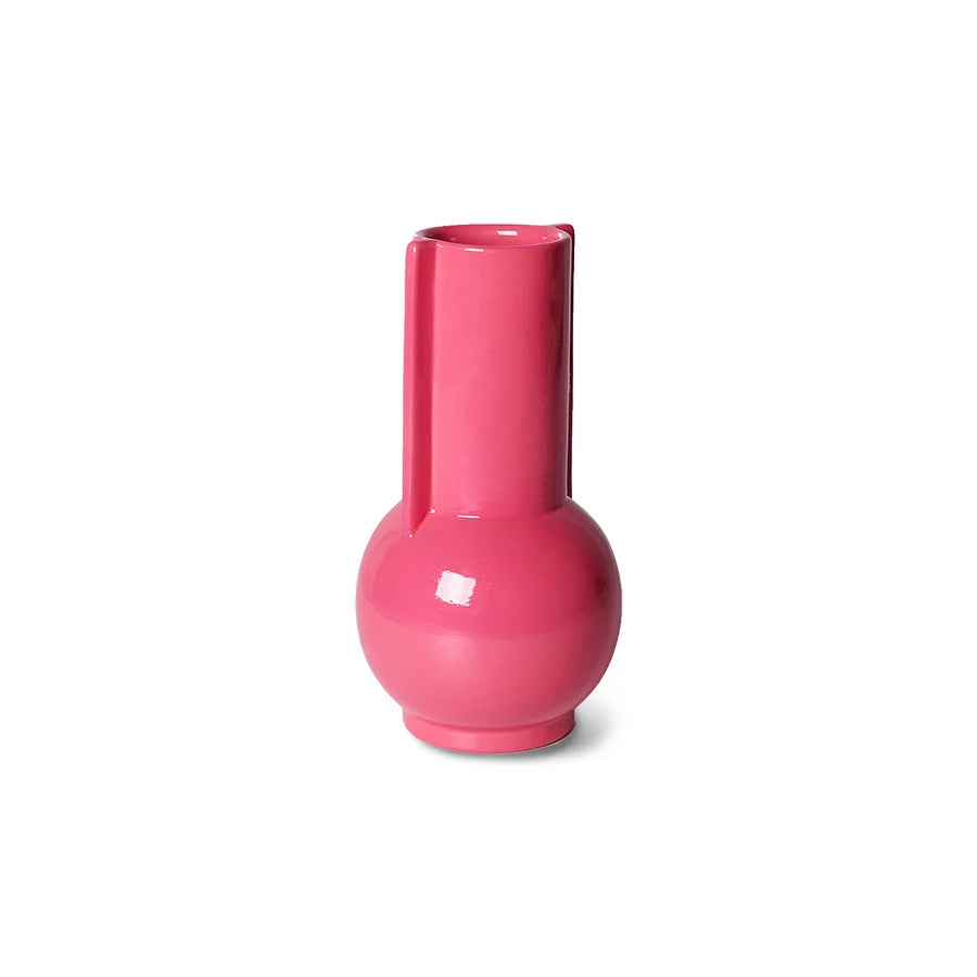 hot pink vase with a lovely shine and slightly more bulbous in the lower third from hkliving