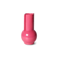hot pink vase with a lovely shine and slightly more bulbous in the lower third from hkliving