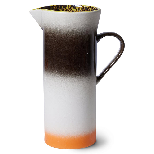 the calm exterior of this tall slender ceramic jug belies the crazy interor of black and yellow from hkliving