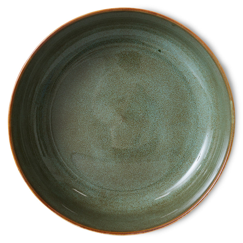 a full top down image of the sunshine bowl showing its speckly green brown inside