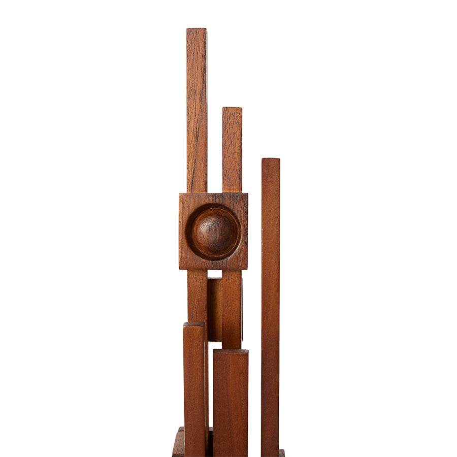 the top third of the large teak wood sculpture