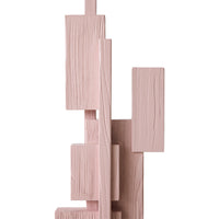 Close-up of the textured wood grain on the soft pink Skyscraper sculpture