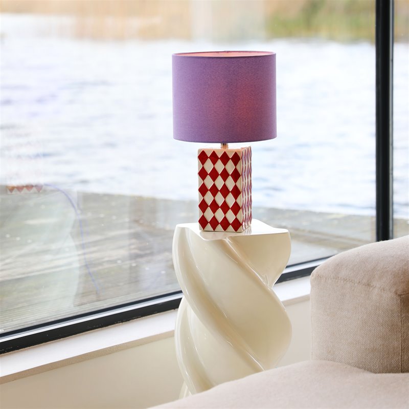 decorative &k Amsterdam patterned table lamp with lilac shade on windowsill
