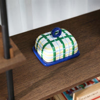 close-up of hand-painted plaid butter dish in blue tones
