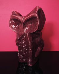 Side view of Marni x Serax aubergine owl vase showing bold stoneware form